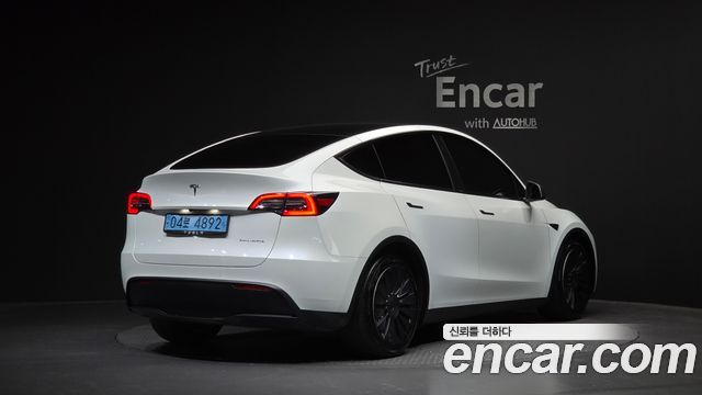 Tesla Model Y Long Range AWD - фото 1
