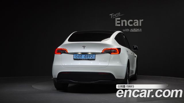 Tesla Model Y Long Range AWD - фото 3