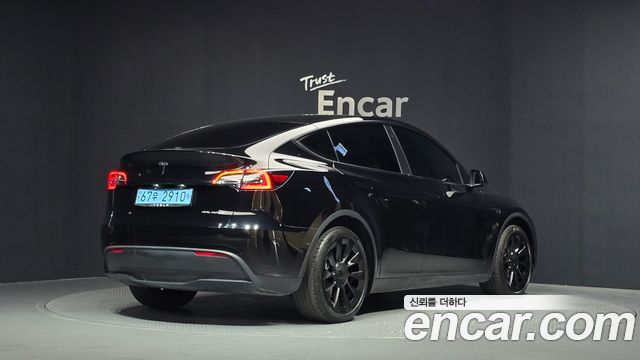 Tesla Model Y Long Range AWD - фото 1