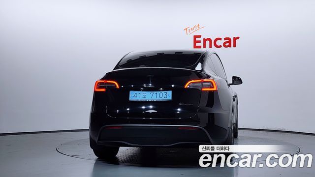 Tesla Model Y Long Range AWD - фото 3