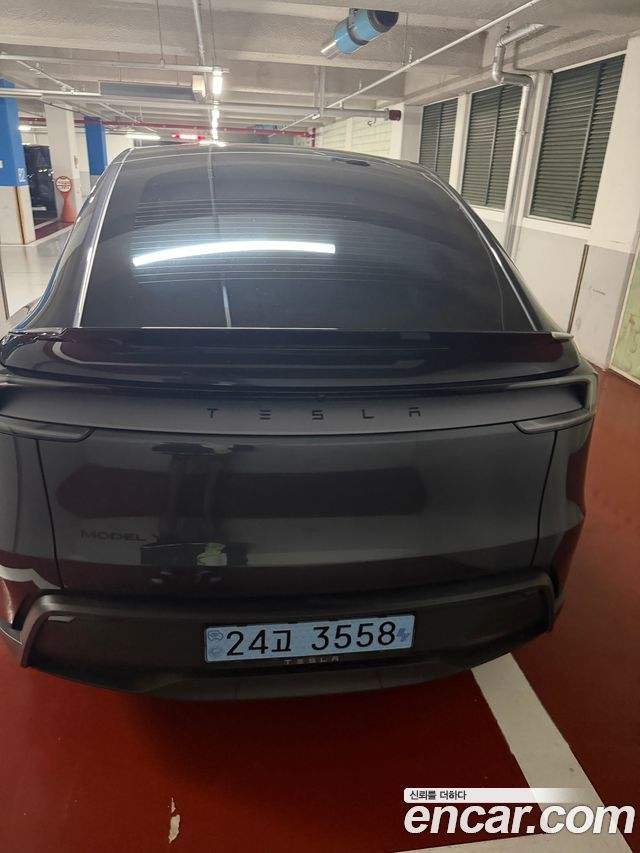 Tesla Model Y L Long Range AWD - фото 1