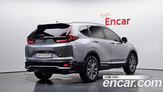Honda CR-V 5-го поколения 1.5 Touring 4WD - фото 0