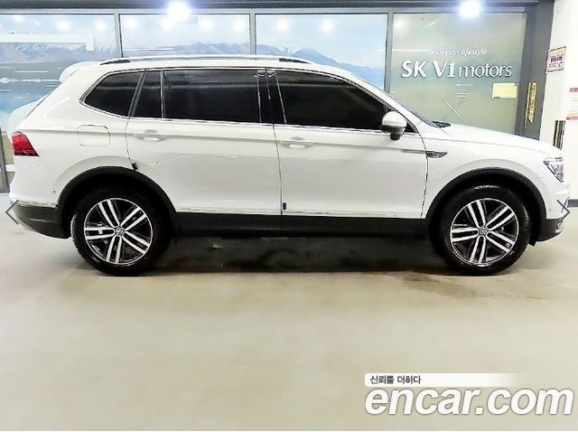 Volkswagen Tiguan 2.0 TDI Prestige - фото 1