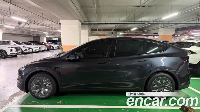 Tesla Model Y L Long Range AWD - фото 1