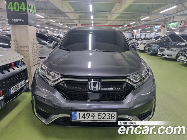 Honda CR-V 5-го поколения 2.0 Hybrid Touring 4WD - фото 1