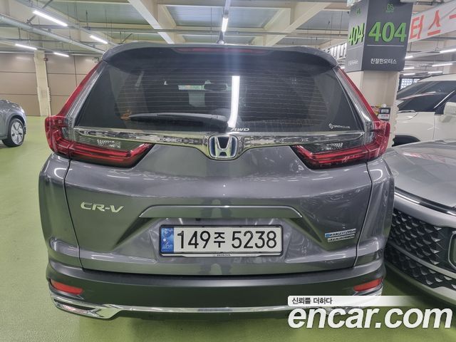 Honda CR-V 5-го поколения 2.0 Hybrid Touring 4WD - фото 2