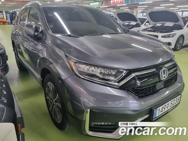 Honda CR-V 5-го поколения 2.0 Hybrid Touring 4WD - фото 3