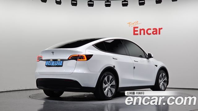 Tesla Model Y Long Range AWD - фото 1