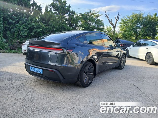 Tesla Model Y Long Range AWD - фото 2