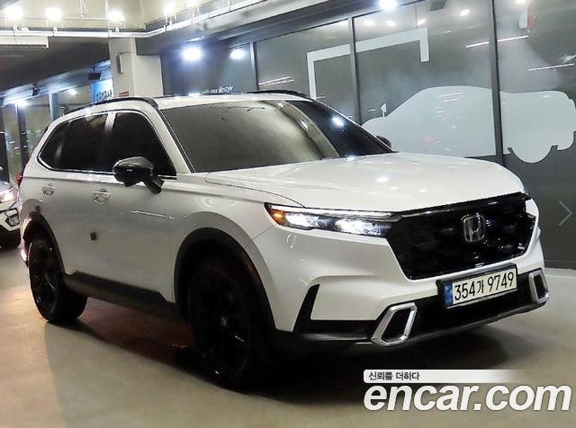 Honda CR-V 6-го поколения 2.0 Hybrid Touring 4WD - фото 0