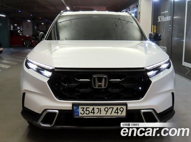 Honda CR-V 6-го поколения 2.0 Hybrid Touring 4WD - фото 1