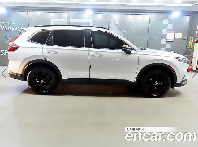Honda CR-V 6-го поколения 2.0 Hybrid Touring 4WD - фото 2
