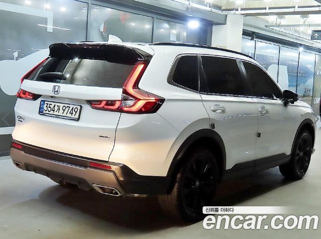 Honda CR-V 6-го поколения 2.0 Hybrid Touring 4WD - фото 3