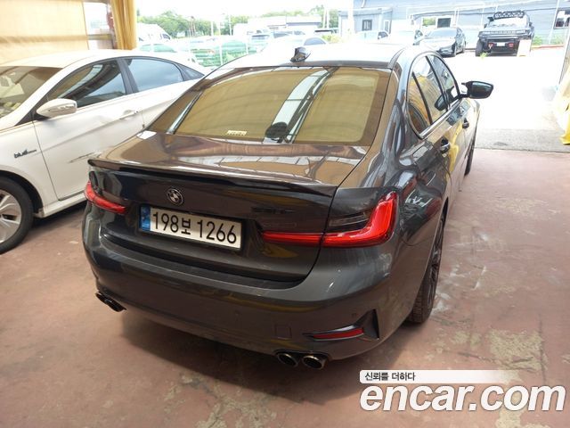 BMW 3 Series G20 330e - фото 1