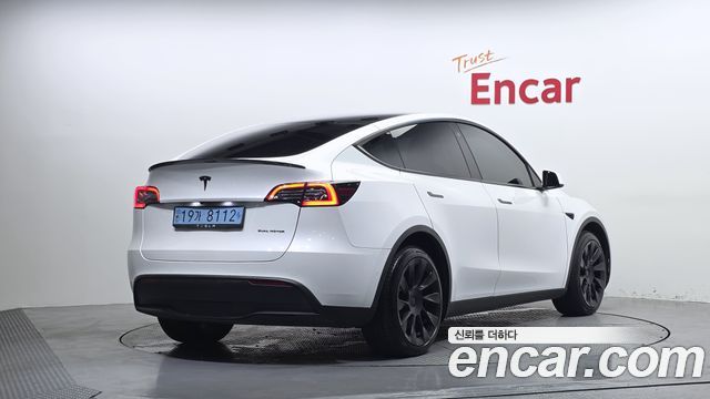 Tesla Model Y Long Range AWD - фото 1