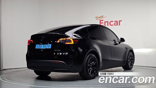 Tesla Model Y Long Range AWD - фото 1