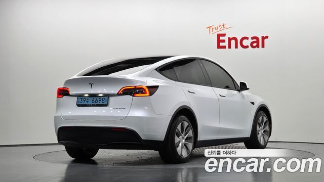 Tesla Model Y Long Range AWD - фото 1