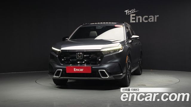 Honda CR-V 6-го поколения 2.0 Hybrid Touring 2WD - фото 1
