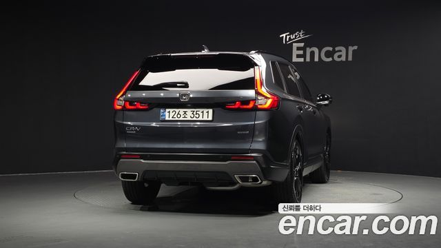Honda CR-V 6-го поколения 2.0 Hybrid Touring 2WD - фото 2