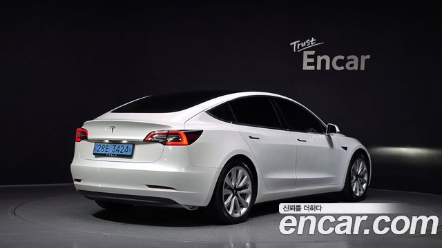 Tesla Model 3 Standard Range Plue RWD - фото 1
