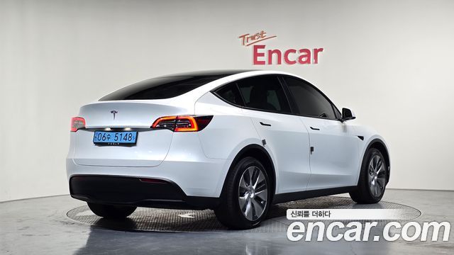 Tesla Model Y Long Range AWD - фото 1