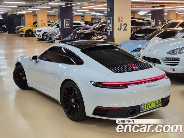 Porsche 911 Carrera 4 - фото 4