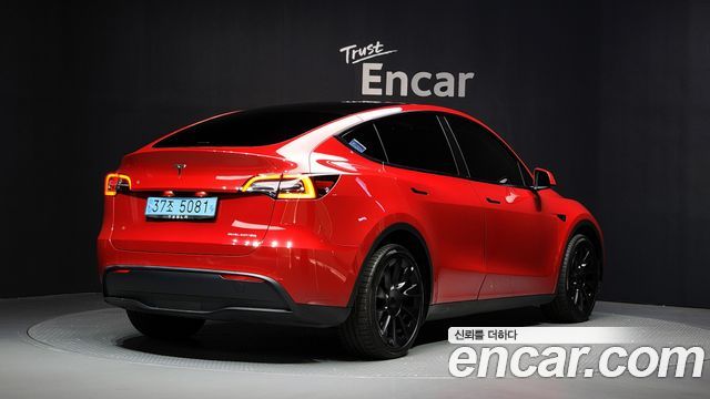Tesla Model Y Long Range AWD - фото 1