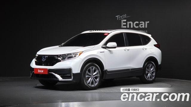Honda CR-V 5-го поколения 2.0 Hybrid Touring 4WD - фото 0