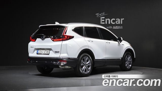 Honda CR-V 5-го поколения 2.0 Hybrid Touring 4WD - фото 1