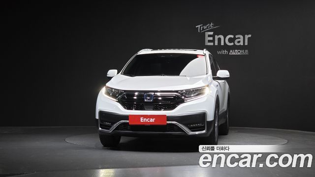 Honda CR-V 5-го поколения 2.0 Hybrid Touring 4WD - фото 2