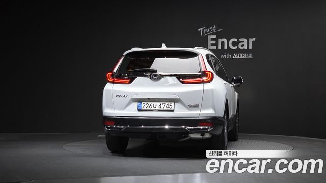 Honda CR-V 5-го поколения 2.0 Hybrid Touring 4WD - фото 3