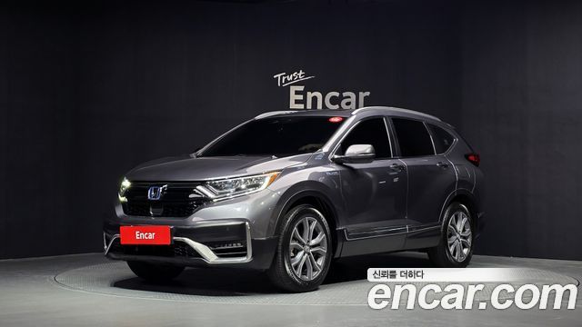 Honda CR-V 5-го поколения 2.0 Hybrid Touring 4WD - фото 0