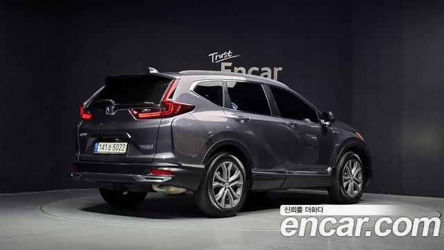 Honda CR-V 5-го поколения 2.0 Hybrid Touring 4WD - фото 1