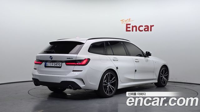 BMW 3-Series G20 320i Touring M Sports - фото 1