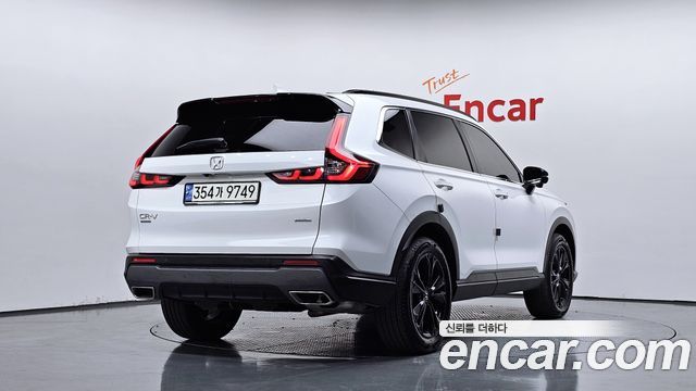 Honda CR-V 5-го поколения 2.0 Hybrid Touring 4WD - фото 1