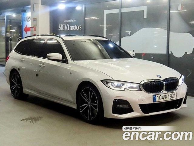 BMW 3-Series G20 320i Touring M Sports - фото 0
