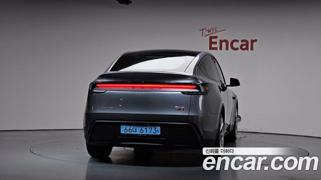 Tesla Model Y Long Range AWD - фото 2