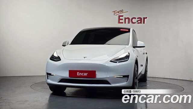 Tesla Model Y Standard Range RWD - фото 1