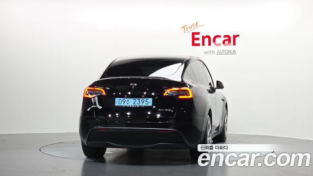 Tesla Model Y Long Range AWD - фото 3