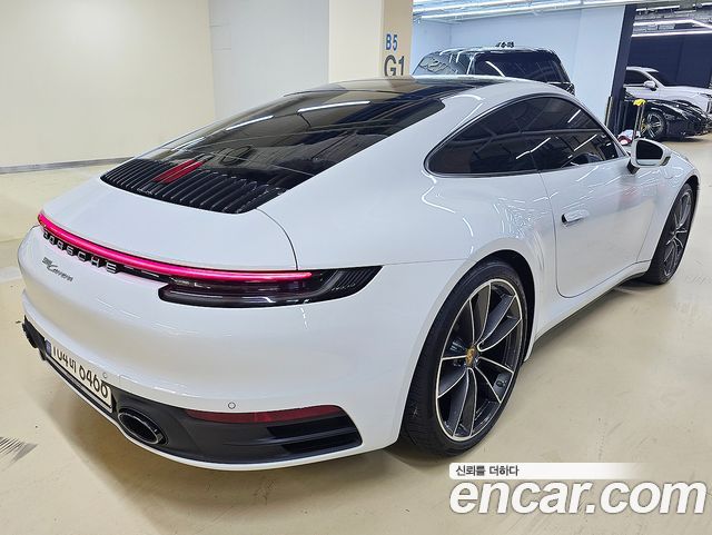 Porsche 911 Carrera - фото 1