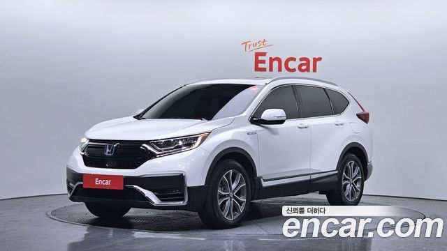 Honda CR-V 5-го поколения 2.0 Hybrid Touring 4WD - фото 0
