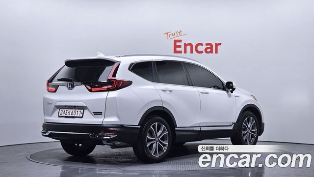 Honda CR-V 5-го поколения 2.0 Hybrid Touring 4WD - фото 1