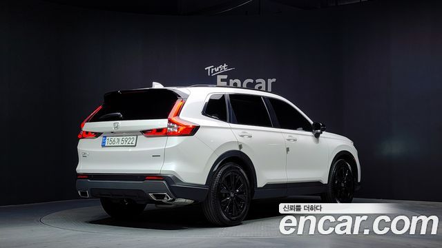 Honda CR-V 6-го поколения 2.0 Hybrid Touring 2WD - фото 1