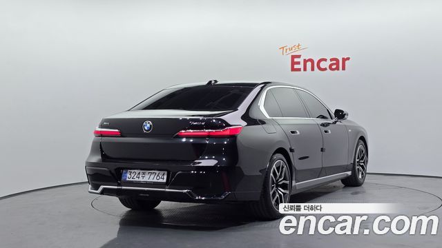BMW 7-Series G70 740d xDrive M Sport - фото 1