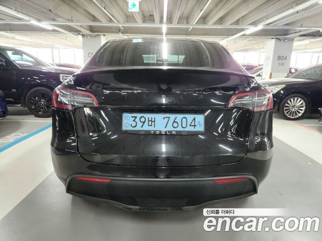 Tesla Model Y Standard Range RWD - фото 4