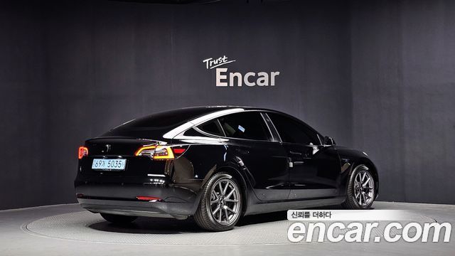 Tesla Model 3 Standard Range Plue RWD - фото 1