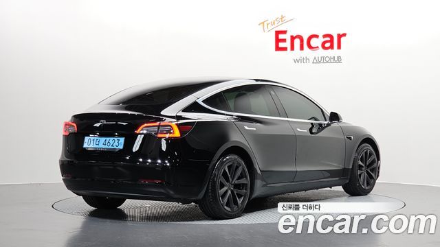 Tesla Model 3 Standard Range Plue RWD - фото 1