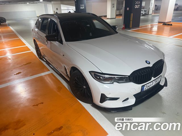 BMW 3-Series G20 320i Touring Luxury - фото 0