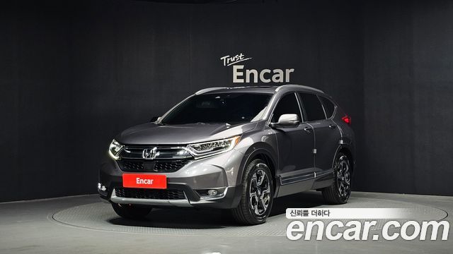 Honda CR-V 5-го поколения 1.5 Touring 4WD - фото 0