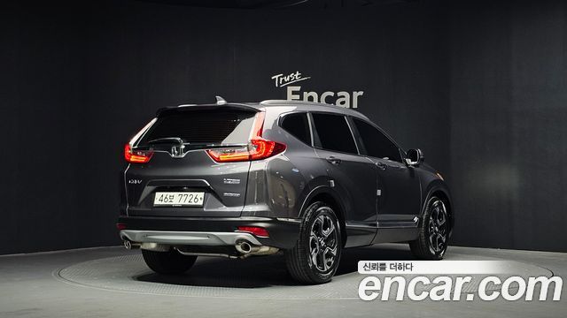 Honda CR-V 5-го поколения 1.5 Touring 4WD - фото 1
